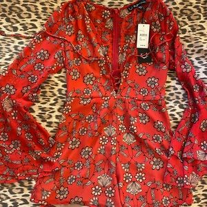 For love and lemons red jumpsuit in size XS